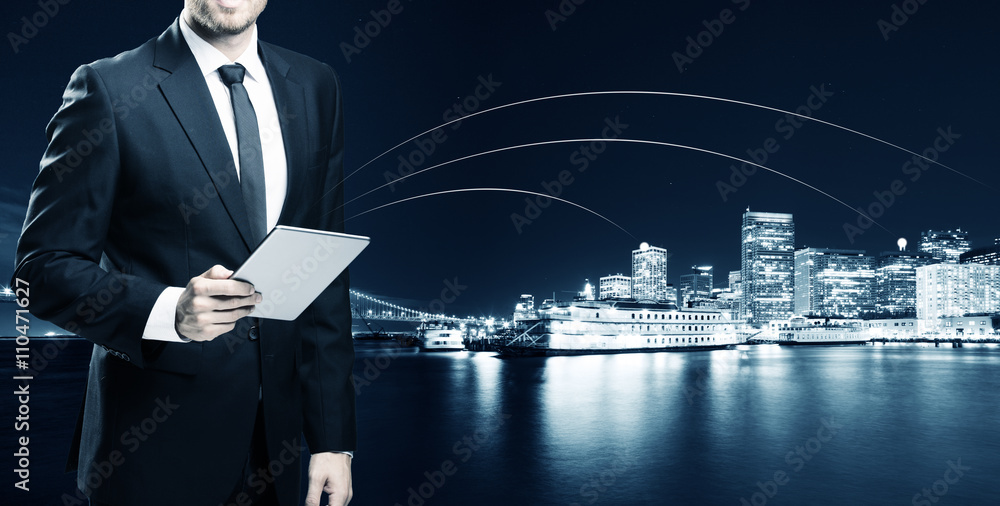 businessman with tablet with passenger liner on water in san fra