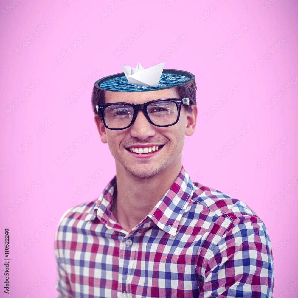 Composite image of young businessman smiling