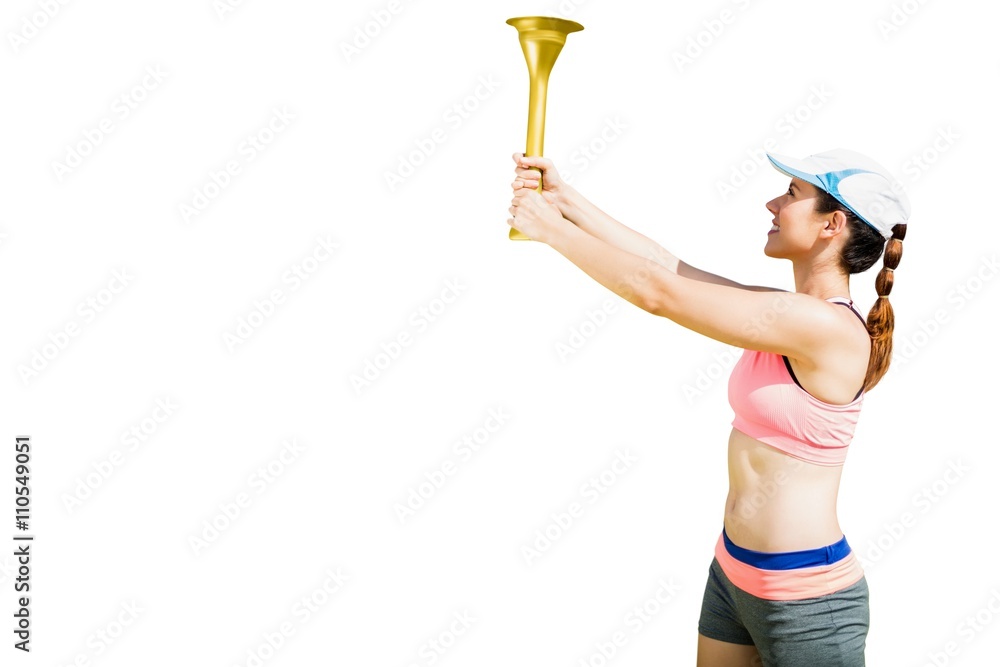 Sporty woman holding Olympic torch