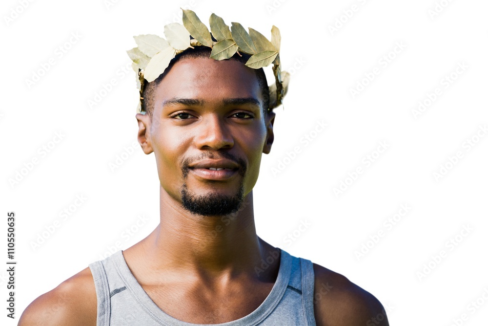 Portrait of victorious sportsman with crown of laurels 