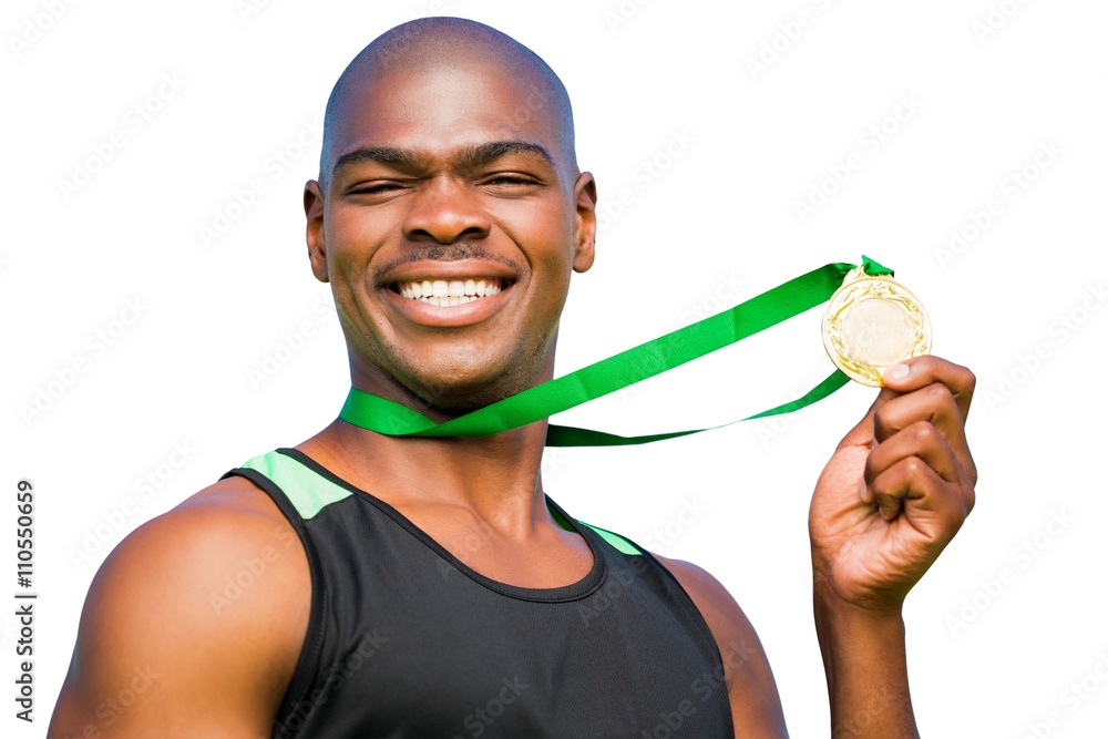 Portrait of sportsman is posing with his medal 