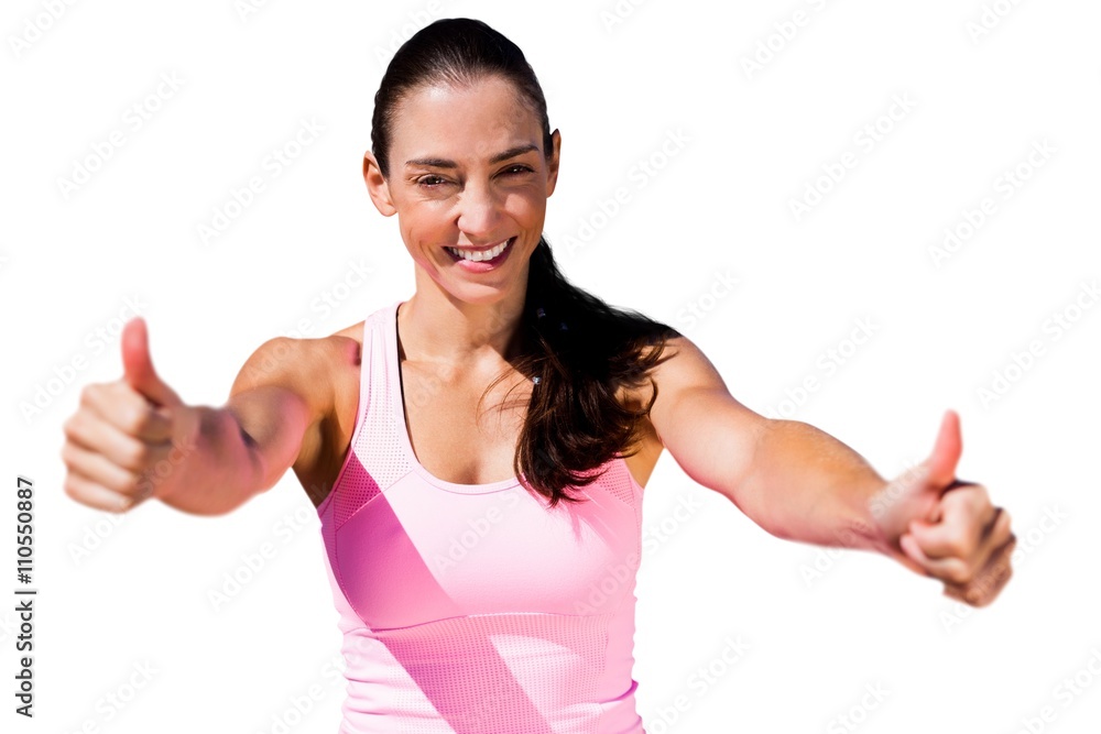 Portrait of sportswoman is smiling with thumbs up