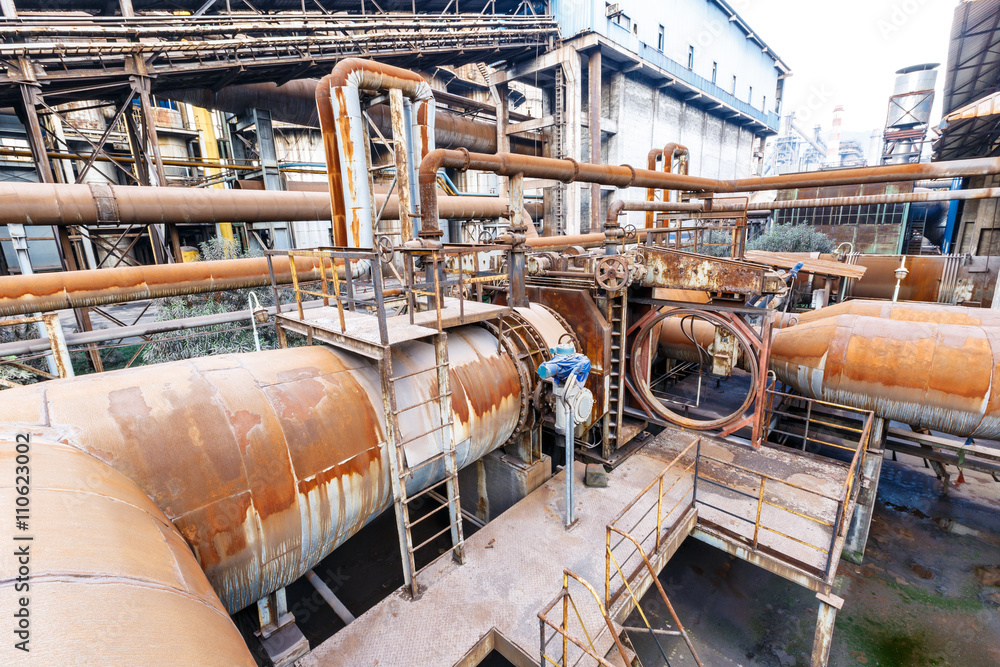 Industrial pipeline equipment scene in the old steel mill