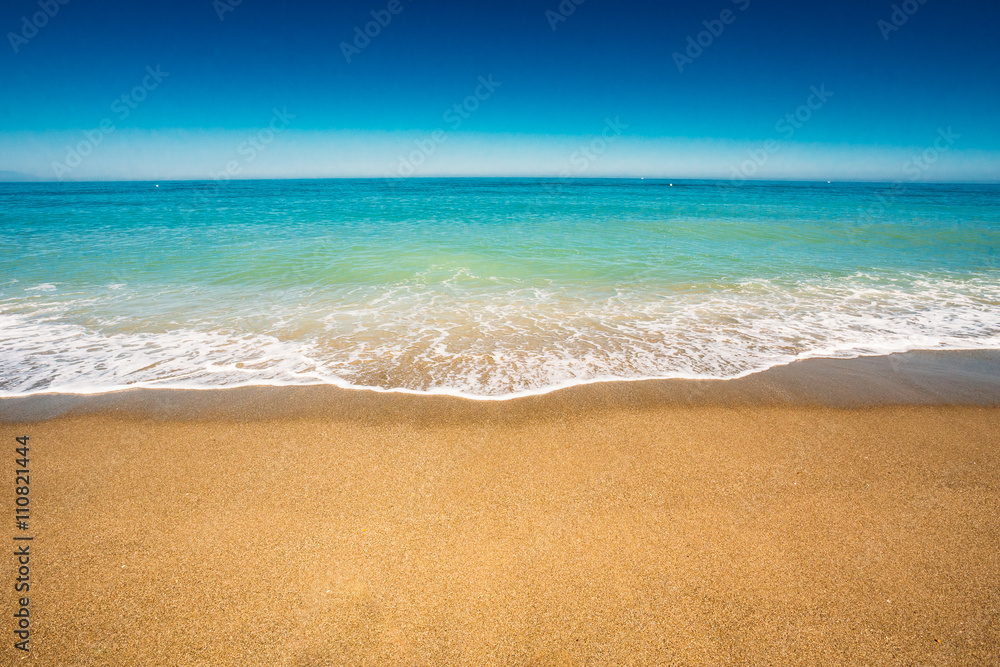 Soft Sea Ocean Waves Wash Over Golden Sand Background. Sea water