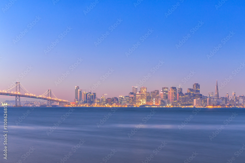 water,bay bridge with cityscape and skyline of san francisco