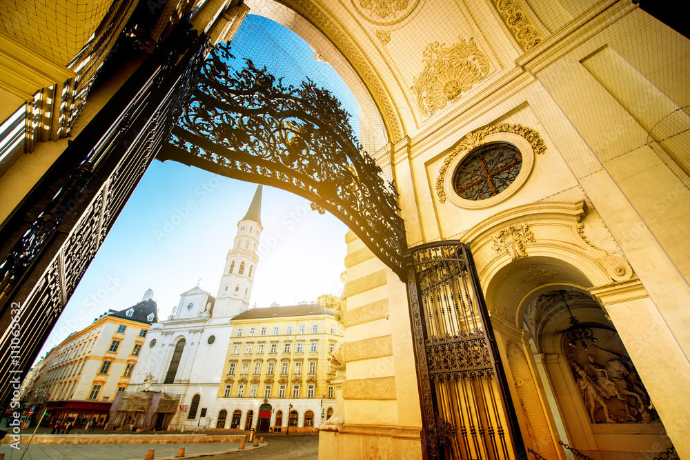 Gate of St. Michael Wing with Michael church in Vienna