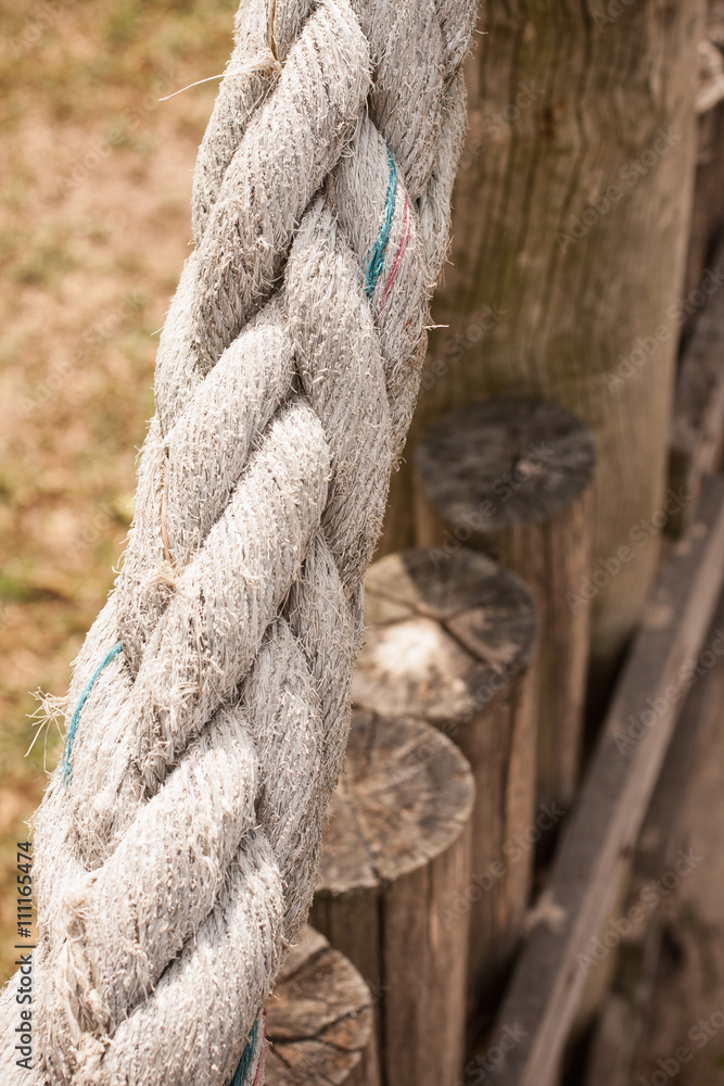 Wooden fence with rope