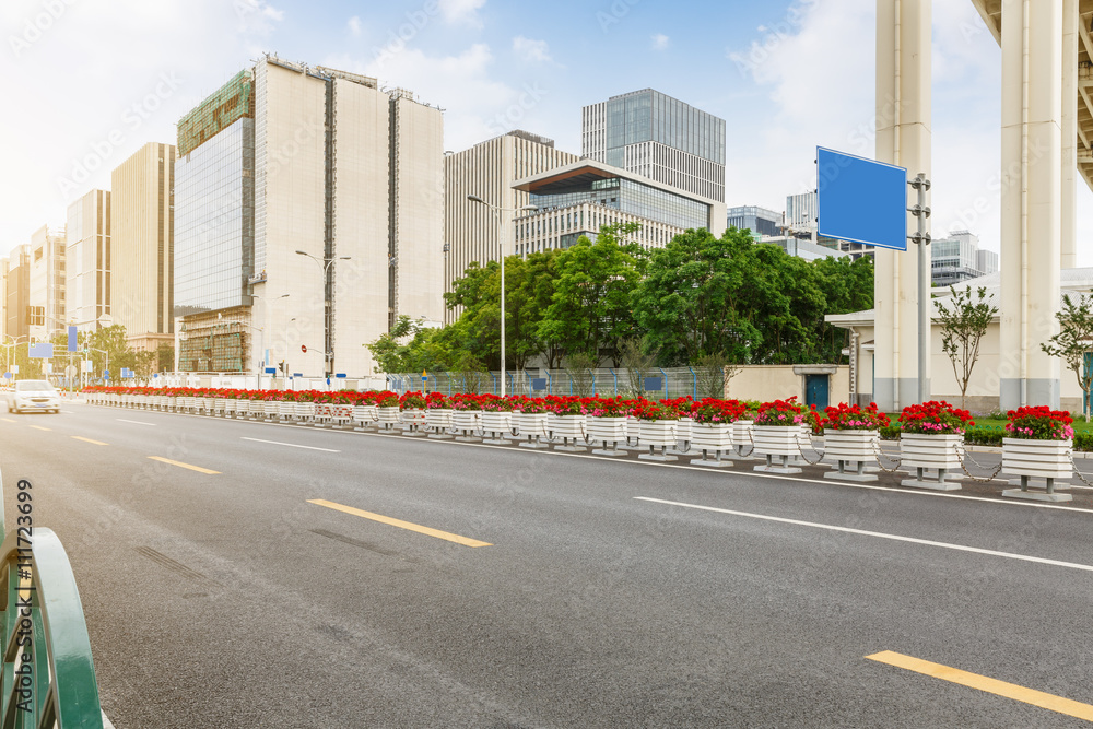 Asphalt roads and modern urban architecture scene in Shanghai