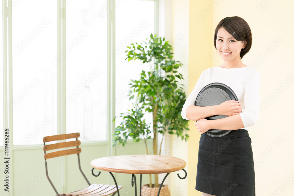 portrait of asian waitress in the cafe