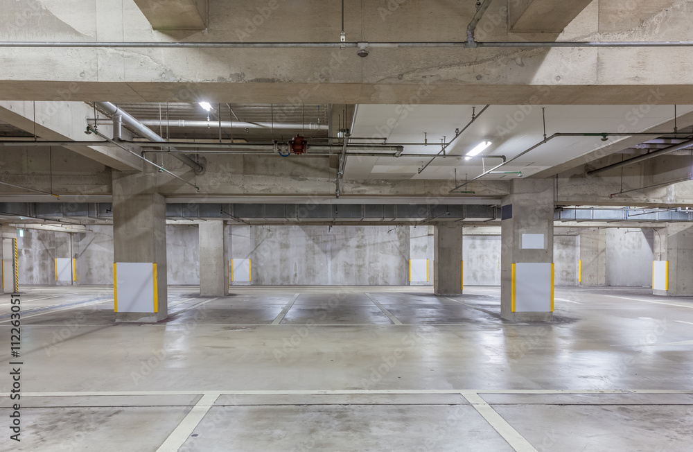 Parking garage underground interior with neon lights , Empty Parking lot , Car park at underground b