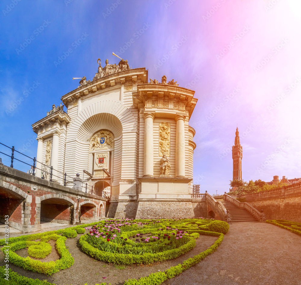 View of french city Lille with belfry, council hall and Paris’ gate