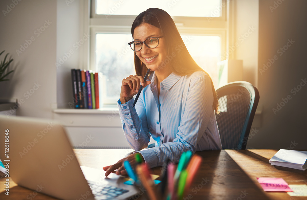 Smiling woman working at office