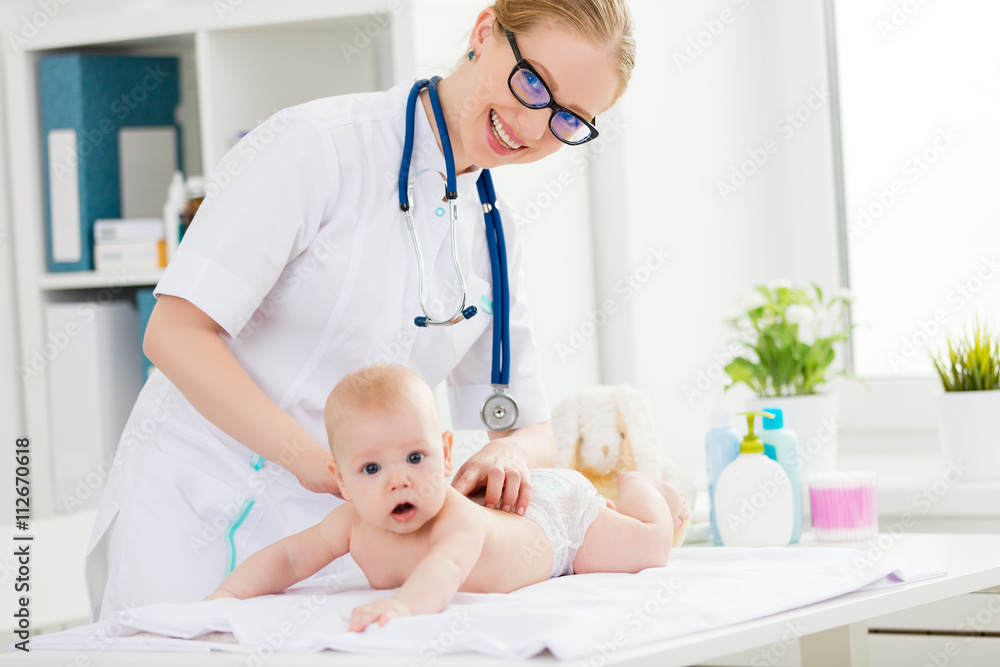 Doctor makes the baby massage