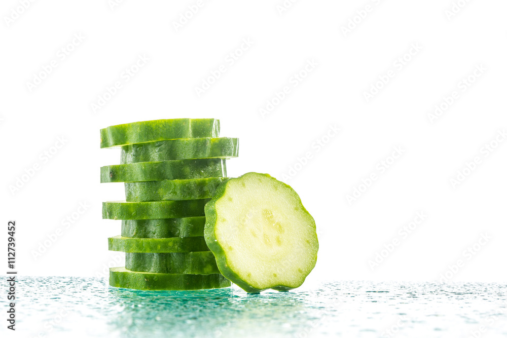 Fresh Cucumber slices on white background