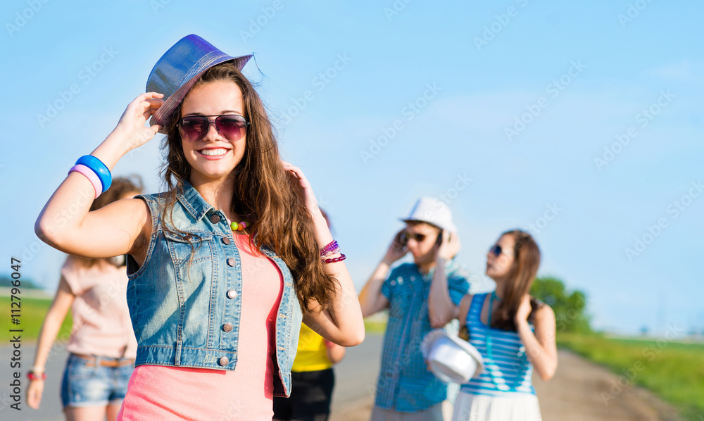 stylish young woman in sunglasses