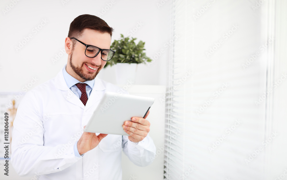 Doctor with tablet computer