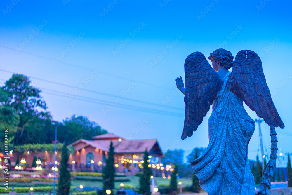 The angel stature in front of Coffee shop