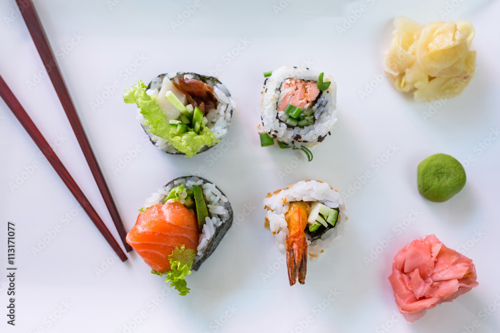 Sushi set with chopsticks on the plate