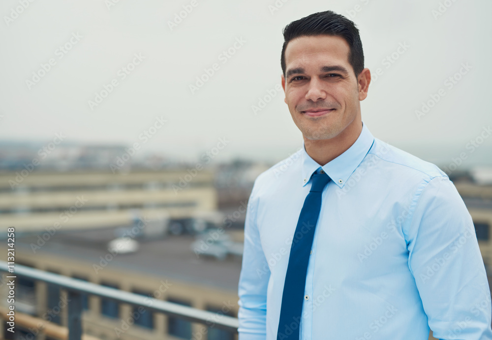 Smiling relaxed Hispanic businessman