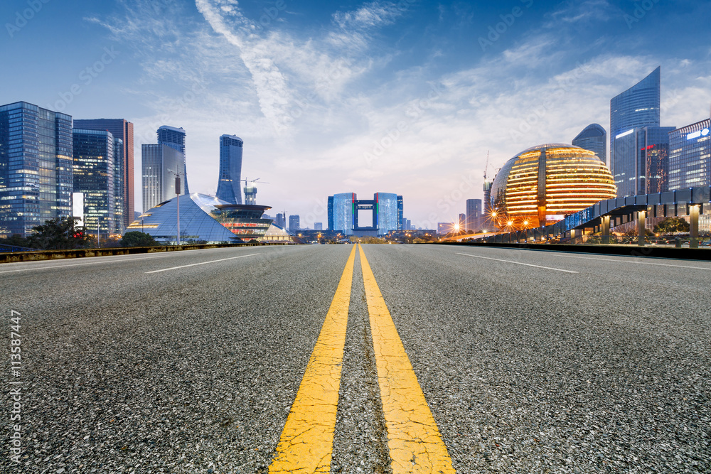 Asphalt roads and beautiful scenery of the city at night in Hangzhou