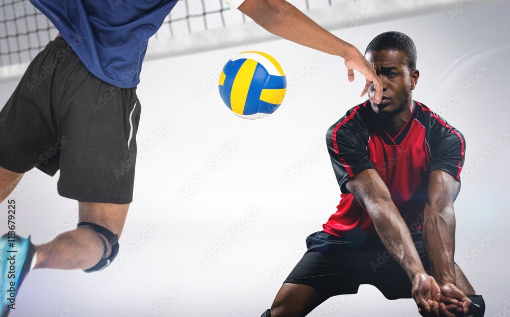 Composite image of rear view of sportsman posing while playing volleyball