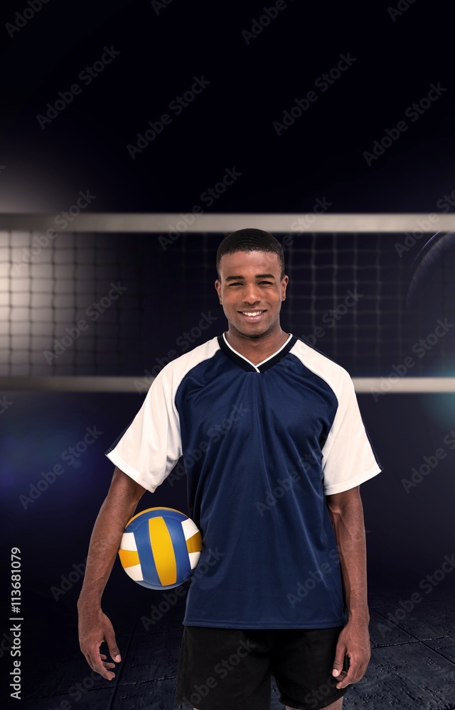 Composite image of sportsman holding a volleyball