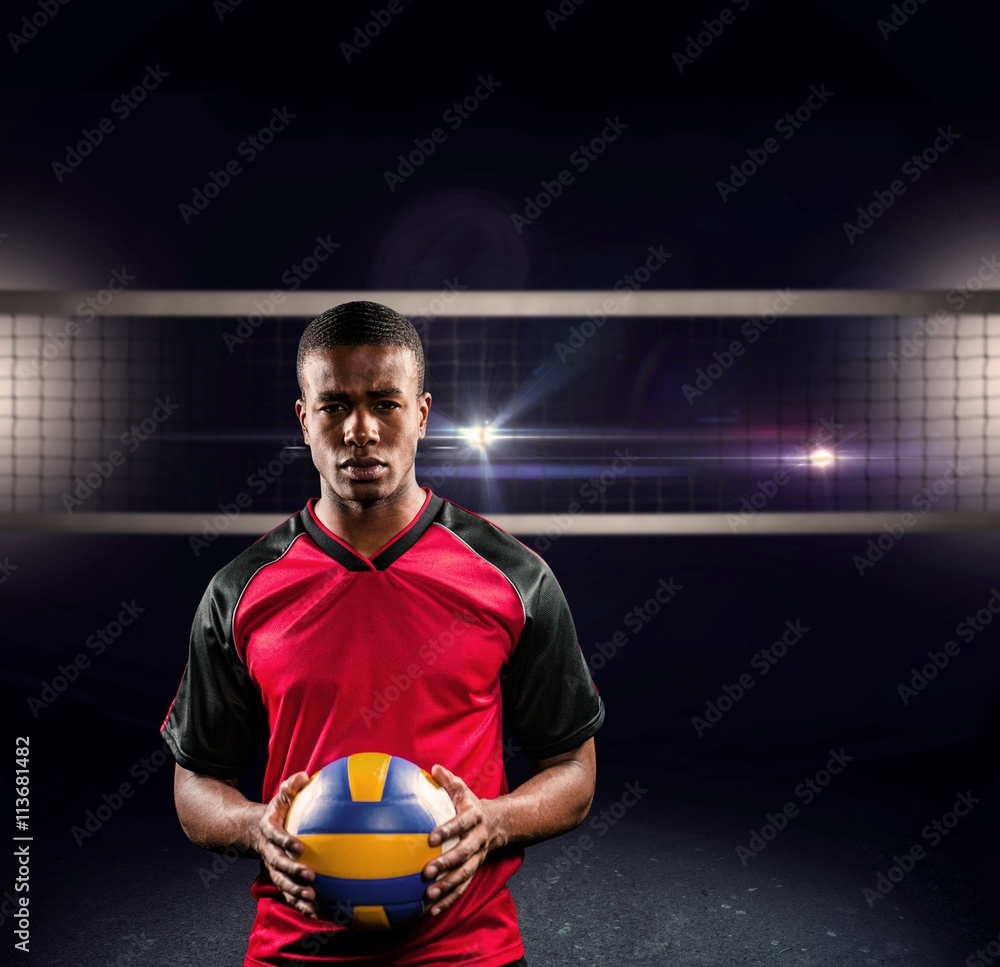 Composite image of sportsman holding a volleyball