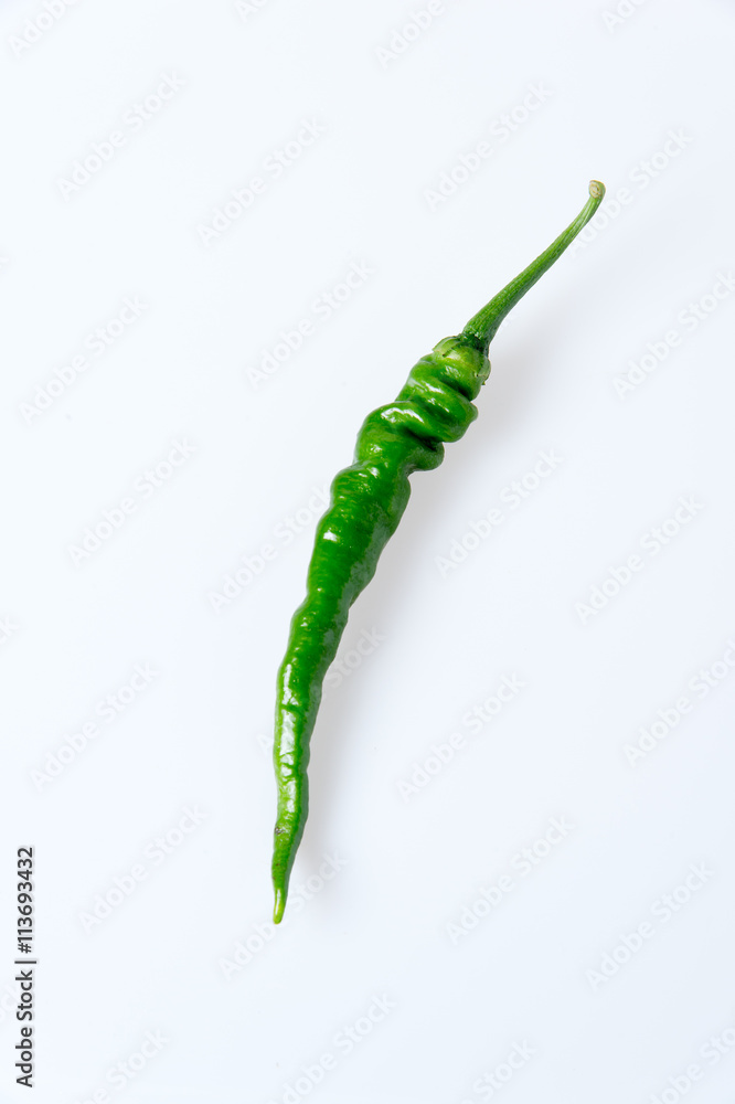 green hot pepper on a white background