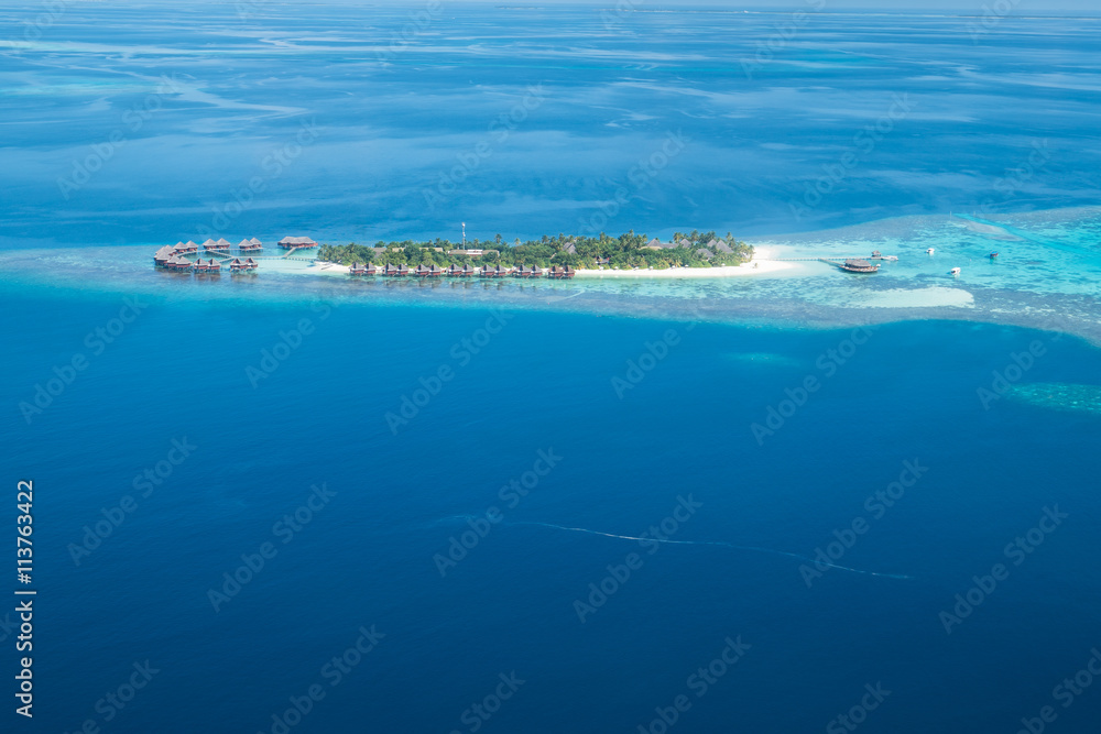 Tropical islands and atolls in Maldives from aerial view