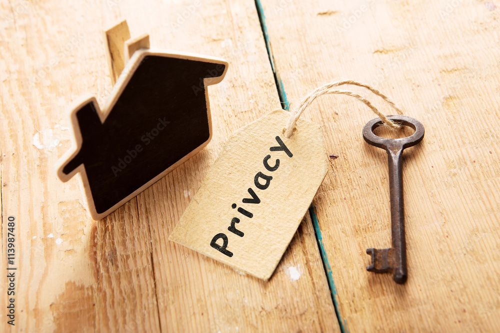 privacy concept - vintage key with tag with inscription