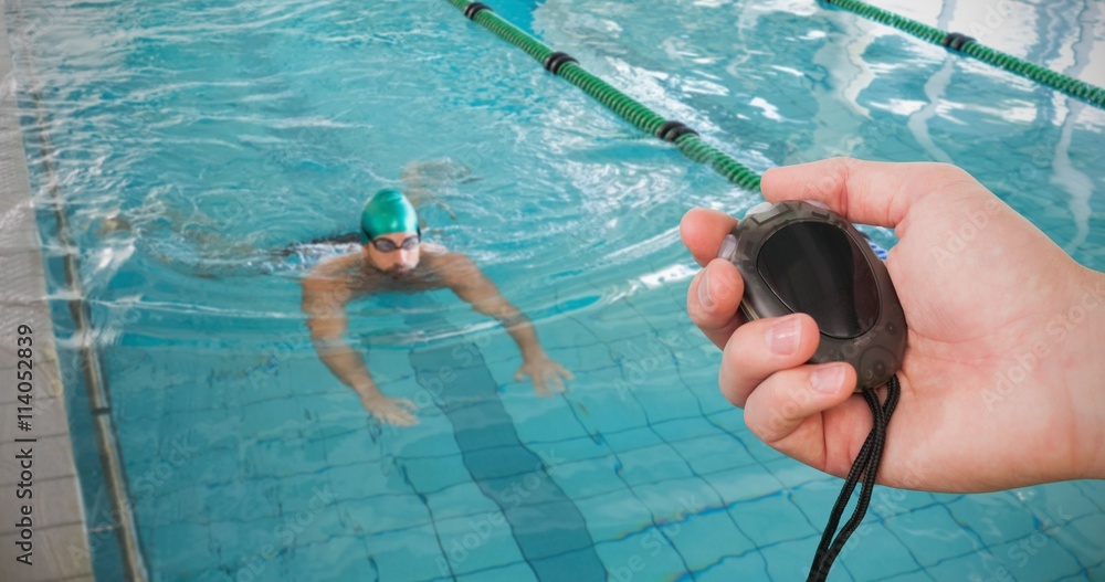 Close up of coach is holding a stopwatch