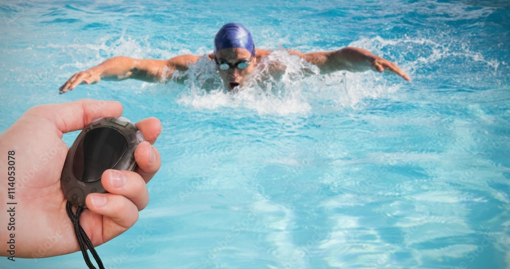 Close up of coach is holding a stopwatch