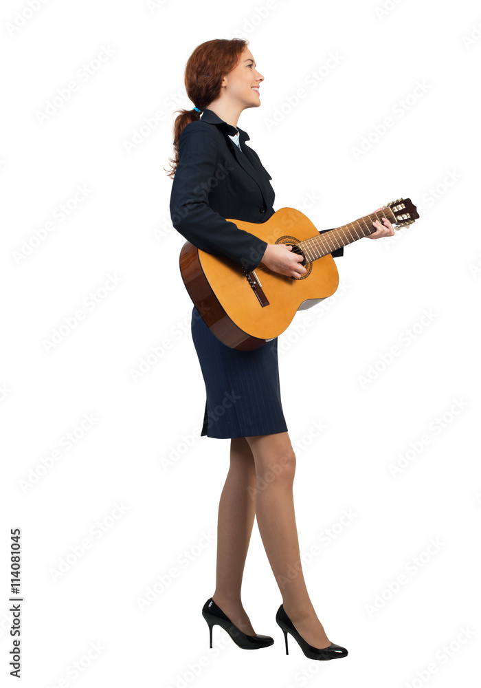 Businesswoman with guitar