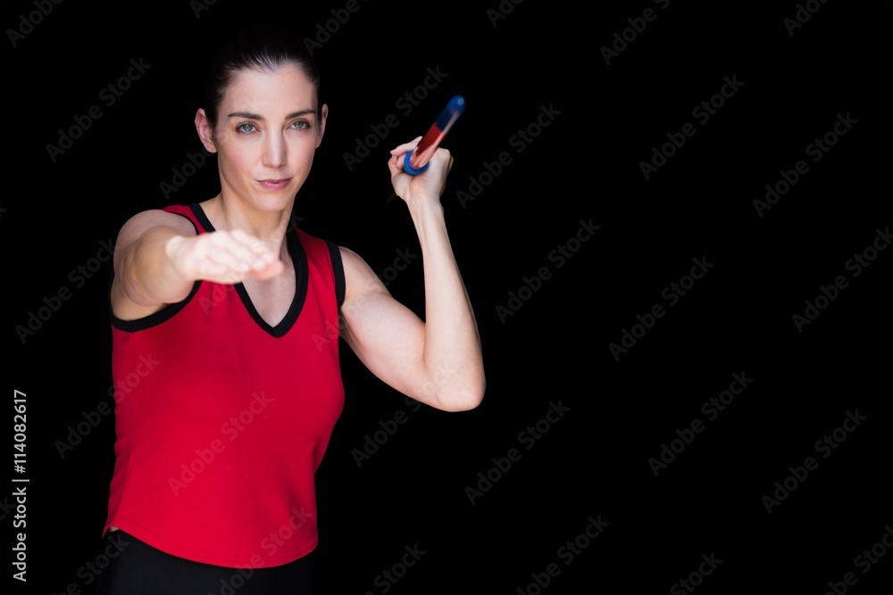 Composite image of female athlete throwing a javelin 