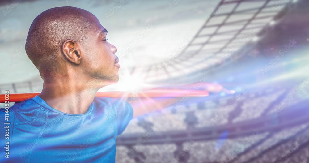 Composite image of close up of sportsman holding a javelin 