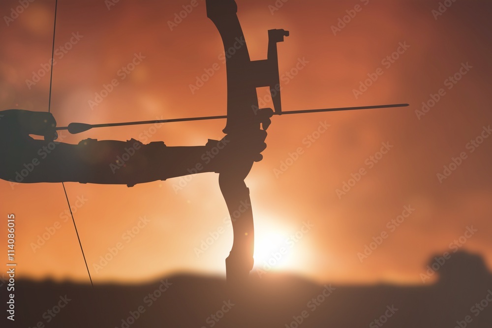 Composite image of close up of someone practising archery 