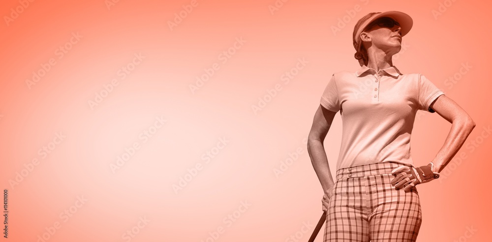 Composite image of woman playing golf