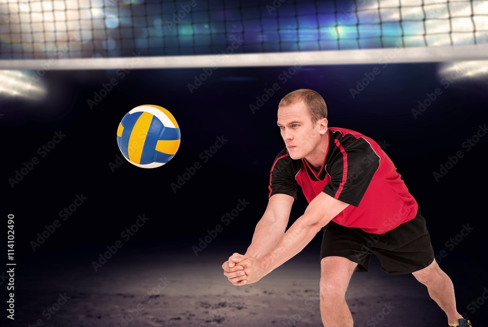 Composite image of sportsman playing volleyball