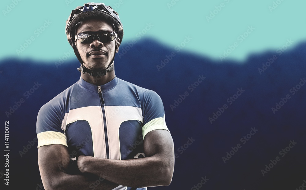 Composite image of cyclist crossing his arms