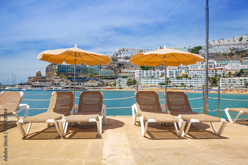 Parasols on the beach of Puerto Rico, Gran Canaria