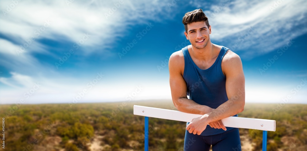 portrait of sportsman is smiling and posing 