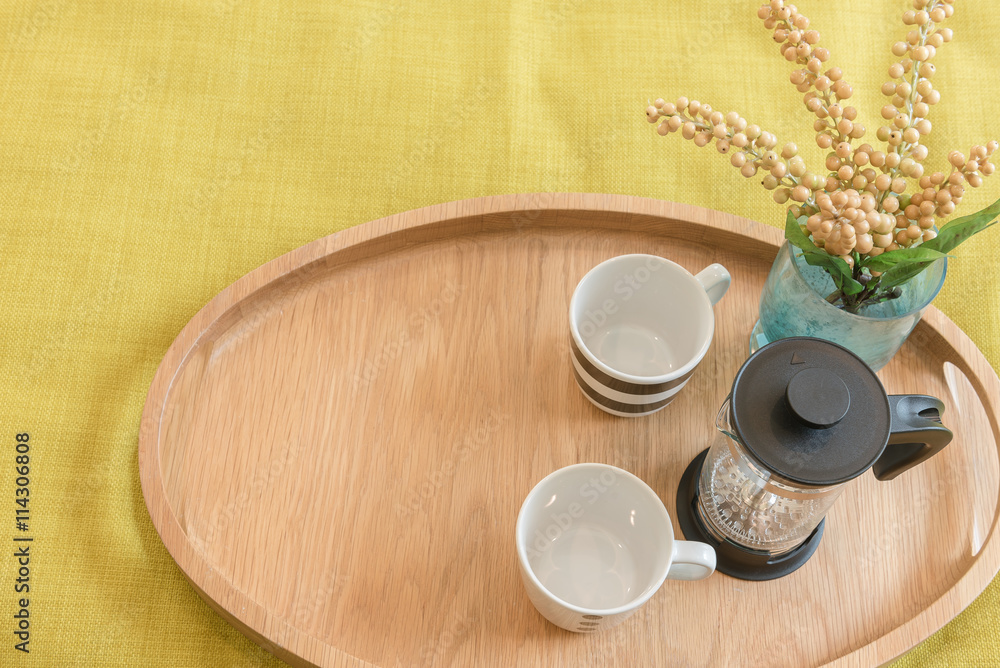 set of tea on wooden tray