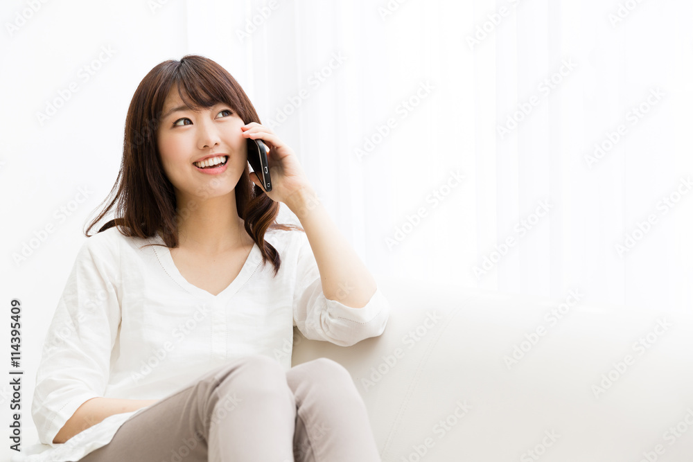 attractive asian woman using smart phone