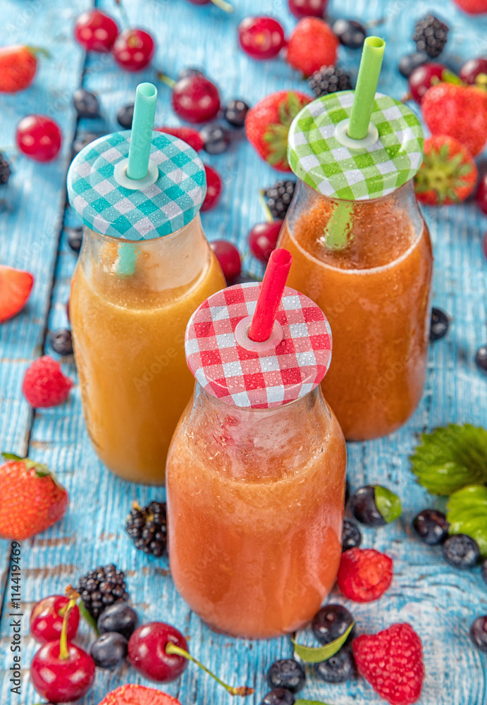 Fresh juice drinks served on wooden table