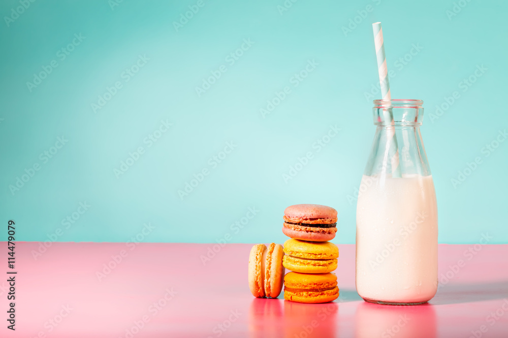 Stack of macarons with botle of milk