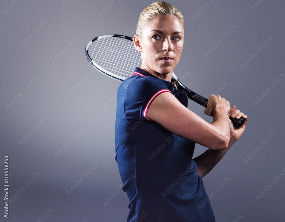 Composite image of tennis player playing tennis with a racket