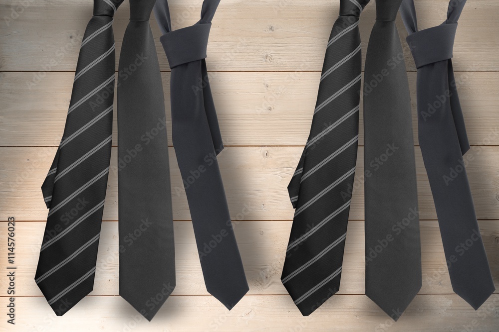 Composite image of blue tie with diagonal line