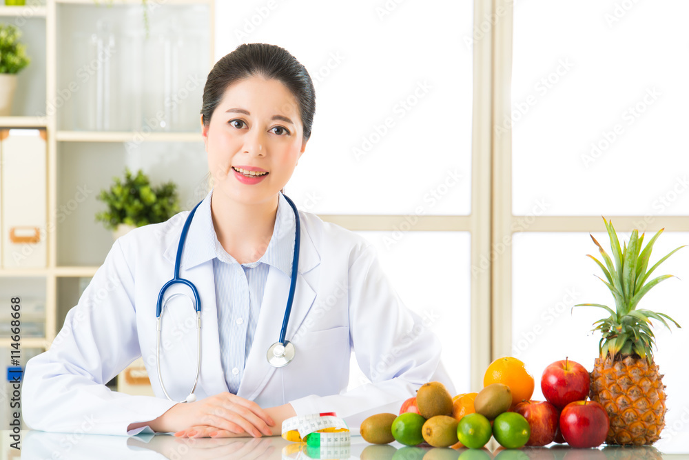 Doctor nutritionist with fruits and vegetable