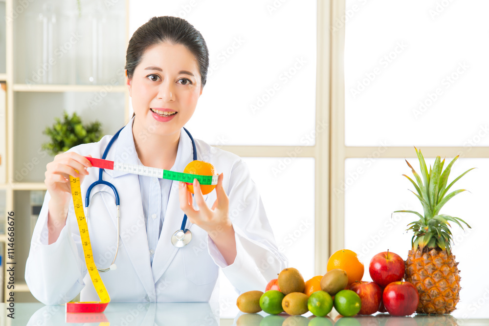 Doctor nutritionist with fruits and vegetable