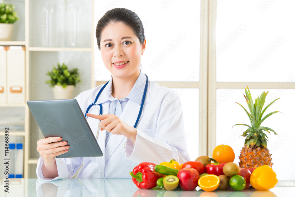 Doctor nutritionist with fruits and vegetable